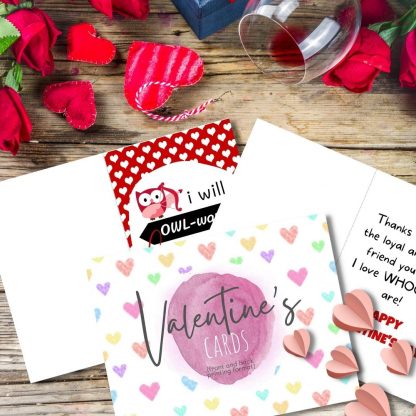 Valentines day cards templates on table with flowers and hearts